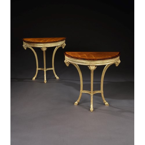 A PAIR OF GEORGE III GILTWOOD AND SATINWOOD PIER TABLES

